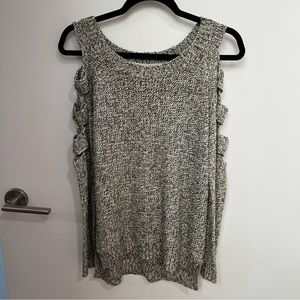 Sweater with arm cut outs